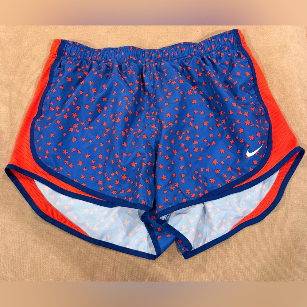 Nike Women's Athletic Shorts with Blue and Red Star Design